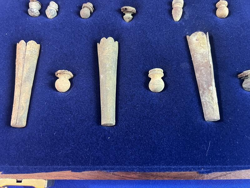 CONFEDERATE COLLECTION OF DUG BAYONET SCABBARD TIPS AND LEAD CARTRIDGE BOX FINIALS